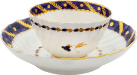 FIRST PERIOD WORCESTER TEA CUP AND SAUCER